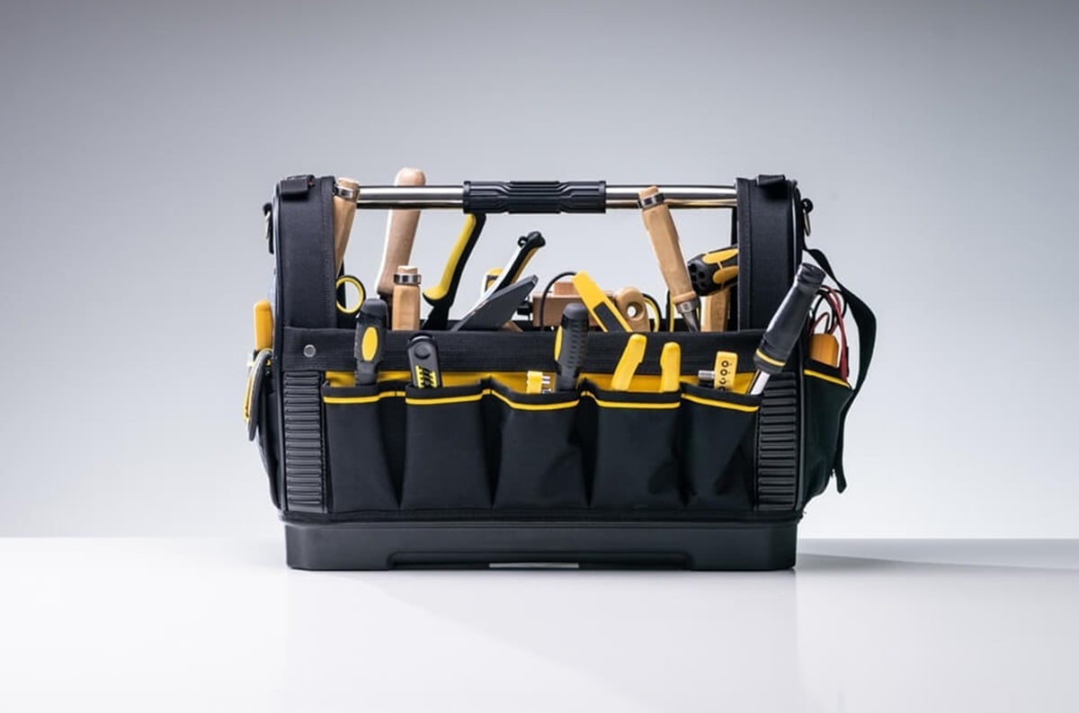 A selection of tools in a carry case/tool bag.